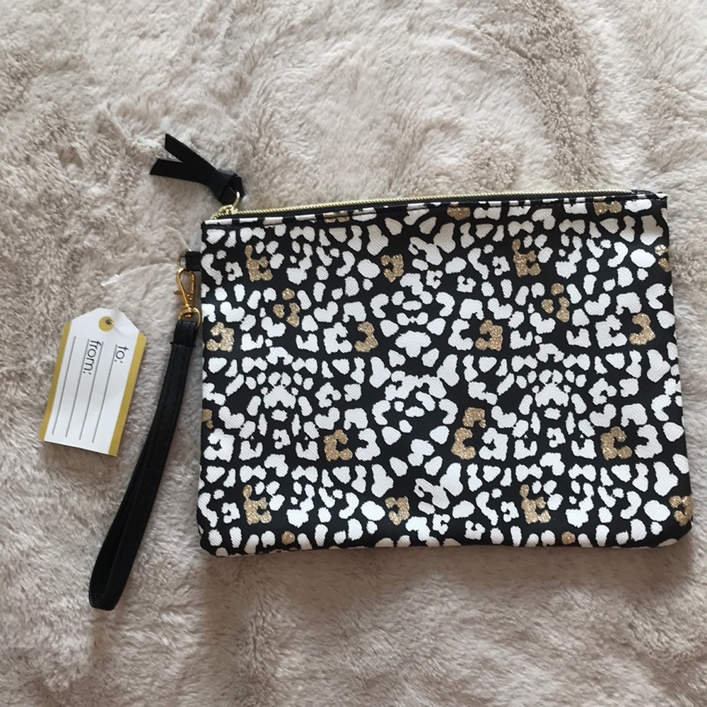 NWT animal print cosmetic bag with gold sparkle